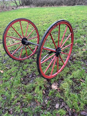 Lot 206 - Pair of 44" metal wheels with channel and rubber tyres, complete with springs and axle