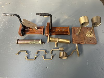 Lot 243 - Five lamp brackets, two whip holders and four brass fixings
