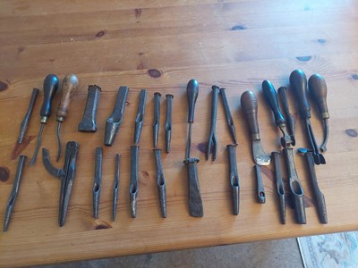 Lot 308 - Assortment of saddlery tools and leatherwork