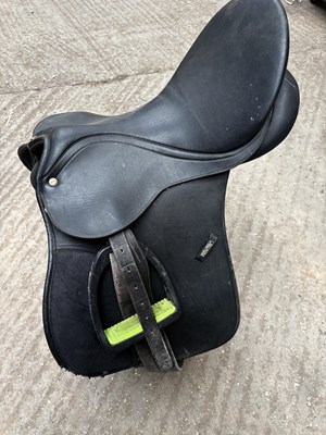 Lot 337 - 17" black leather Wintec saddle with stirrup leathers and irons