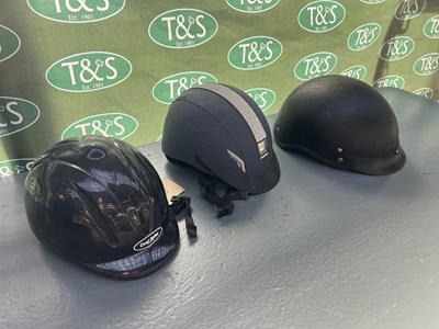 Lot 370 - Hot Leathers' riding hat, model no. NH70 size XL; together with a Gatehouse child's riding hat size 52-58cm; and a Whitaker VX2 child's riding hat, 55-58cm