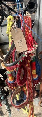 Lot 376 - Decorative headcollar together with three large headcollars