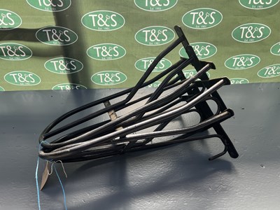 Lot 379 - Four black saddle racks