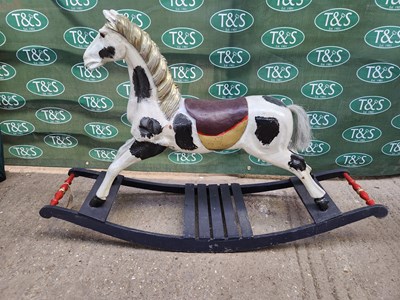 Lot 504 - Rocking Horse, measuring 4ft long, 31" high, 13.5" wide.