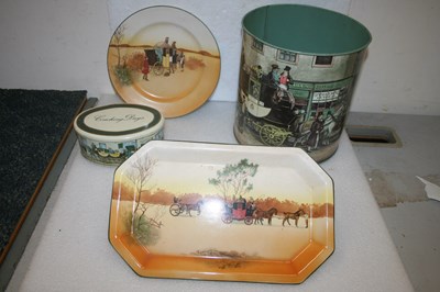 Lot 534 - Two Royal Doulton plates with coaching scenes, with two tins showing coaching scenes
