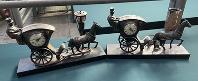 Lot 555 - Pair of model "Hansom Cab" style mantel clocks
