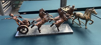 Lot 556 - Brass model of a horse and carriage and wooden water jack, together with a Roman soldier chariot sculpture in a copper finish