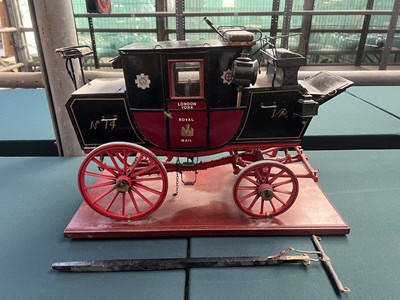 Lot 558 - Model of a Royal Mail Road Coach complete with shafts, height 37 cm, base size 50 x 25