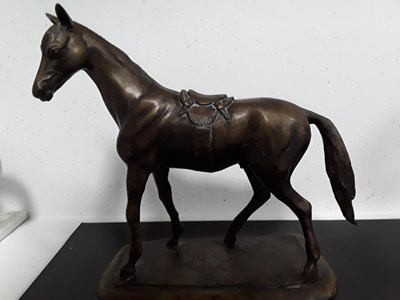 Lot 563 - Saddled horse sculpture