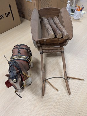 Lot 585 - Model of a two wheel cart with model horse