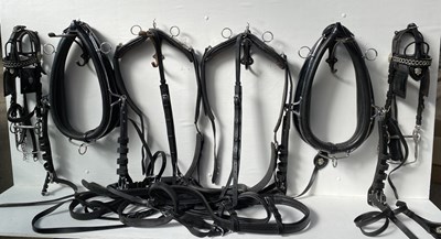 Lot 628 - Pair set of black patent leather and white metal collar harness