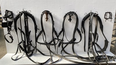 Lot 633 - Part pair set of black and white metal breast collar harness with one bridle