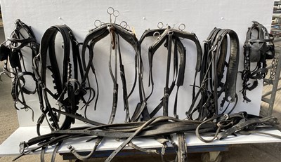 Lot 635 - Set of brown leather harness, complete with 23.5" collar, bridle and reins