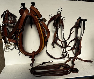 Lot 635 - Set of brown leather harness, complete with 23.5" collar, bridle and reins
