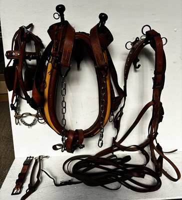 Lot 637 - Set of brown leather harness, complete with 23.5" collar, bridle and reins