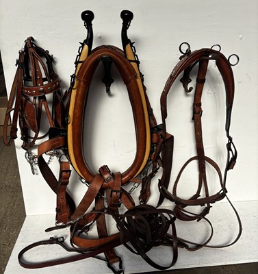 Lot 639 - Set of brown leather harness, complete with 23.5" collar, bridle and reins