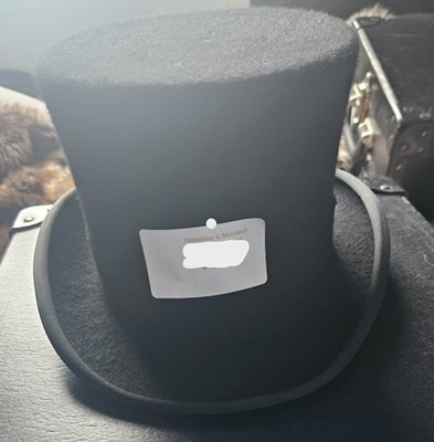 Lot 672 - Top hat in case, size 6 1/8