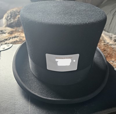 Lot 673 - Top hat in case, size 7 1/8