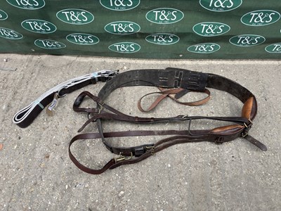 Lot 679 - Brown leather breaking pad with brass fittings with back strap, crupper and traces