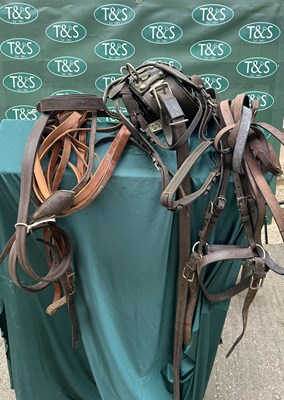 Lot 692 - Part set of brown harness to include pad, breeching, three sets reins, traces and bridle