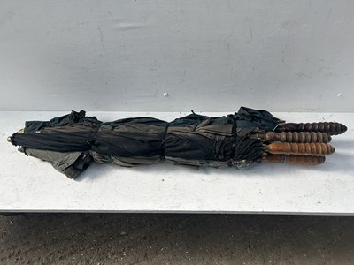 Lot 695 - Five coaching umbrellas