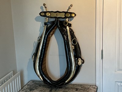 Lot 751 - Adjustable heavy horse collar complete with brass hames and hame plate