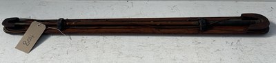 Lot 804 - Jointed holly driving whip by Schomberg of London on a mahogany board