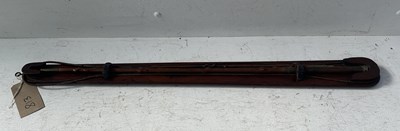 Lot 813 - Jointed holly driving whip by Schomberg of London on a mahogany board stamped 'Schomberg'