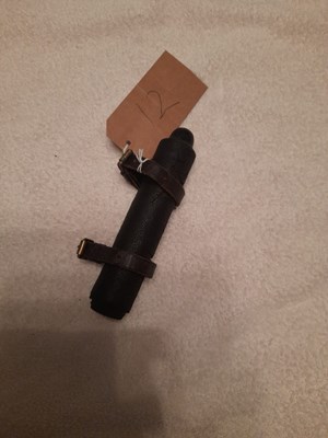 Lot 826 - Leather whip socket with straps