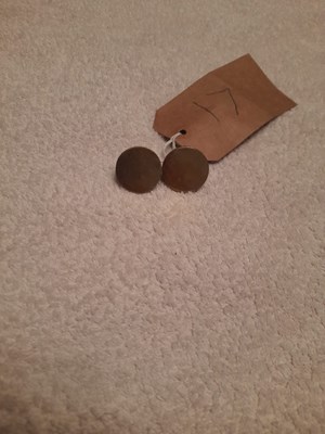 Lot 831 - Two brass bridle rosettes