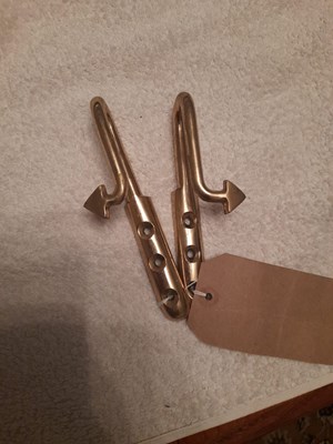 Lot 832 - Pair of brass tug ends for shafts