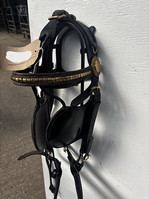 Lot 835 - Pair of black patent leather full size bridles