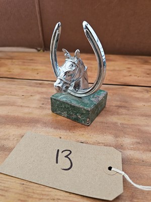 Lot 860 - Chrome horse head in horseshoe mascot