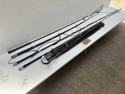 Lot 885 - Collection of driving whips together with a holly whip on navy board with butt stamped Swaine