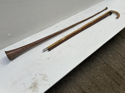 Lot 888 - Round ebony topped cane; horse measuring stick and a copper coach horn