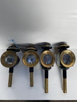 Lot 899 - Two pairs of black and brass round fronted carriage lamps