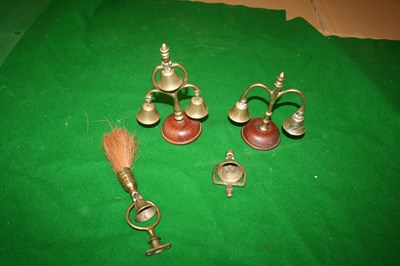 Lot 918 - Four brass fly terrets with bells