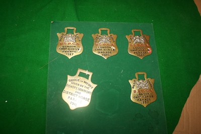 Lot 921 - Four RSPCA brasses and one Bishops Stortford brass