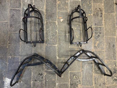 Lot 942 - Pair of blinkered driving bridle racks with two pad racks