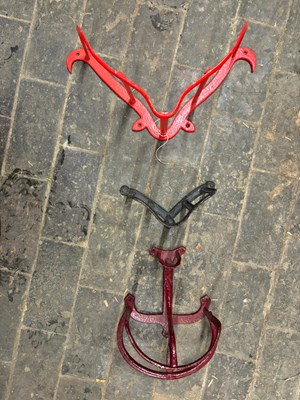Lot 943 - Set of three vintage harness racks