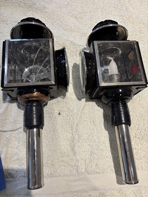 Lot 991 - Pair of white metal lamps, one pane slightly cracked