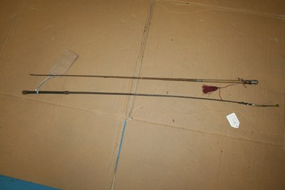 Lot 1014 - Two original side saddle whips