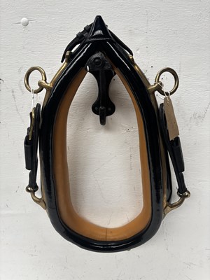 Lot 1022 - 23" black patent show collar by Huskissons, with brass hames, never been used. This lot carries VAT.