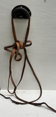 Lot 1046 - Pair of English soft padded leather reins. This lot carries VAT.