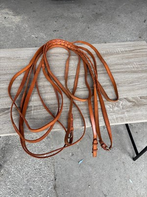 Lot 1068 - New brown reins