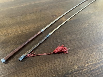 Lot 1076 - 1899 Swaine & Adeney lady's riding whip with silver collar, together with another whip similar