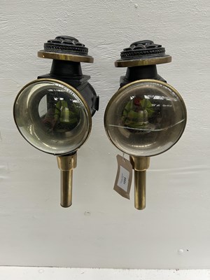 Lot 1088 - Pair of bullseye-fronted lamps