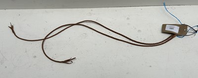 Lot 1091 - Two whip thongs made by Crawley, over sixty years old