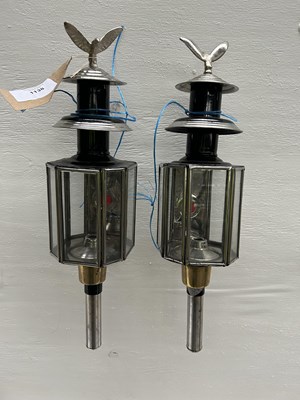 Lot 1138 - Pair of eagle top lamps. This lot carries VAT.
