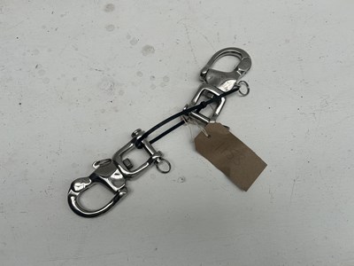Lot 1153 - Pair of quick release snaps. This lot carries VAT.